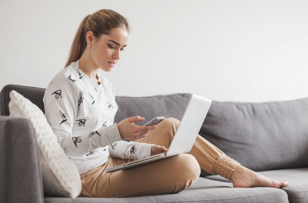 woman uses telehealth